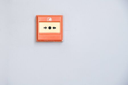 Fire alarm switch on the wall in condominiumの写真素材