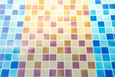 Swimming pool bottom caustics ripple and flow with waves background. Summer background. Texture of...
