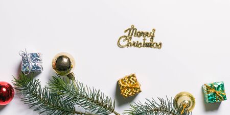 Christmas gift box flat lay on white background with decoration. Happy new year background and backdrop, copy space, top viewの写真素材