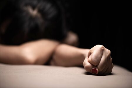 Women violence and abused concept. Stop violence against women, human trafficking.The concept of...