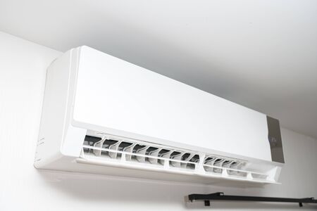 Air conditioner system on white wall roomの写真素材