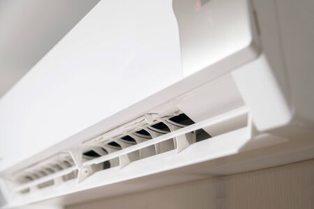 Air conditioner system on white wall roomの写真素材
