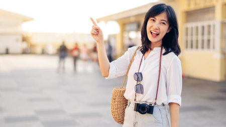Happy youth asian woman person with camera travels street city trip on leisure weekend. Young...