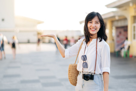 Portrait of young beautiful woman explore street in Bangkok, Thailandの写真素材