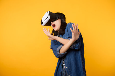 Asian young woman get experienced wearing virtual reality headset game entertainment isolated on...