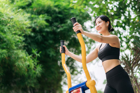 Young asian athletic sportswoman wearing sportswear listening relaxing music while working out...