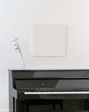 Create a stylish and comfortable home interior with contemporary Scandinavian design, complemented by artistic wall frames.の写真素材