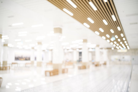 Blurred, defocused background of public hall. Abstract blur exhibition hall event background