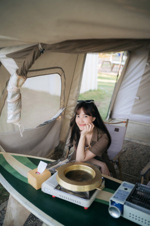 Asian woman with camping activityの写真素材