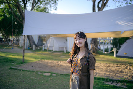 Asian woman with camping activity