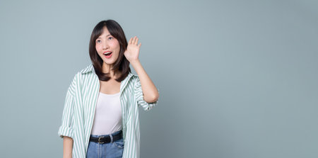 Southeast asian woman with creative smile is small business owner in retail and online shopping industry startup, showing excitement and confidence in her storeの写真素材