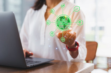 A woman entrepreneur focuses on green sustainable business goals. esg concept icon represents environment social governance strategy for small business progress towards sustainable futureの写真素材