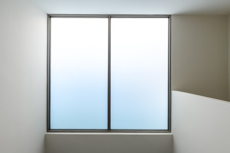 Minimalist frosted glass window detail in modern house during renovation. construction project...