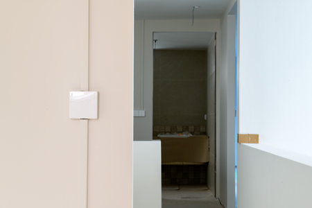 Calm interior detail of modern house renovation showing minimalist hallway and architectural...