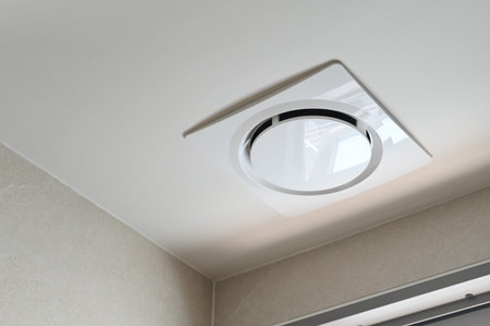 Modern ceiling ventilation fan, white square design, installed in bathroom ceiling, minimalistic...