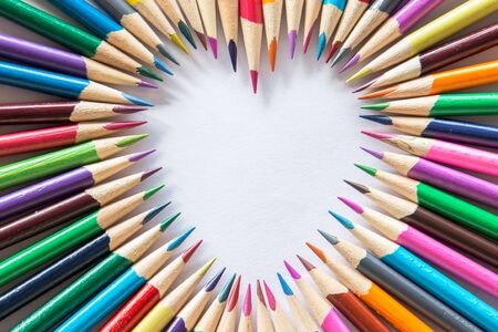 Valentine\'s day love concept with colored pencils : Love is colorful ; Love is youの写真素材