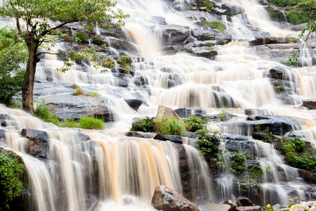 Mae Ya waterfall at Doi Inthanon national park, Chiang mai ,Thailand : conveying smooth flowing motion. Conceptual and useful for backgroundの写真素材