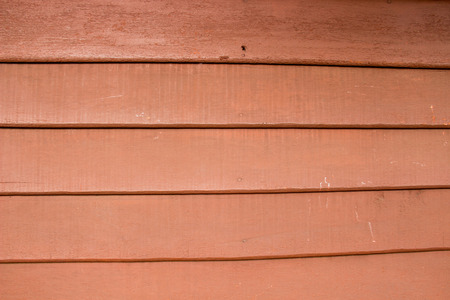 Red wood wall: texture / backgroundの写真素材