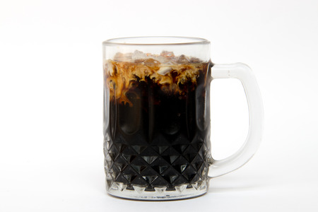 Thai Ice Black coffee topping with fresh milkの写真素材