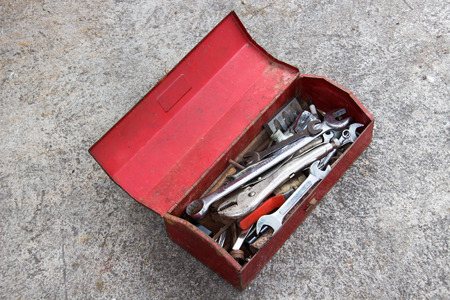 Red Metal Tool Box on Concrete Floorの写真素材
