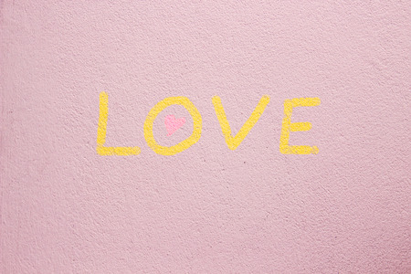 Word LOVE on cement backgroundの写真素材