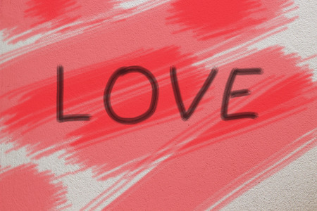 Word LOVE on cement backgroundの写真素材
