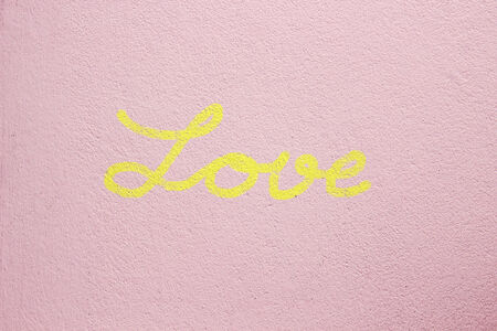 Word LOVE on cement backgroundの写真素材