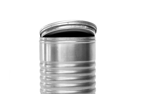 Antique aluminum can open up isolated on whiteの写真素材