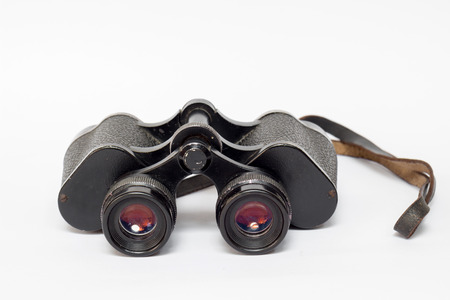 Classic binoculars or spyglass on a white backgroundの写真素材