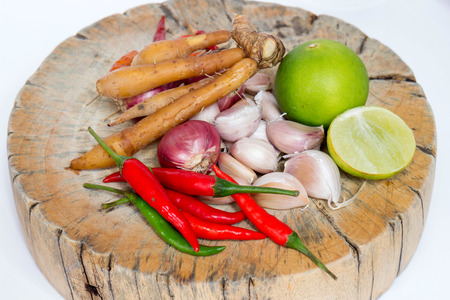 Herbs and spices set on the chopping block to make spicy soup and fried delicious recipes, spicy ingredient in Thailandの写真素材