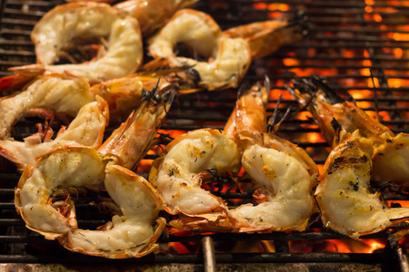 Tiger Prawn barbecue on a gridiron over fire at the seafood night marketの写真素材