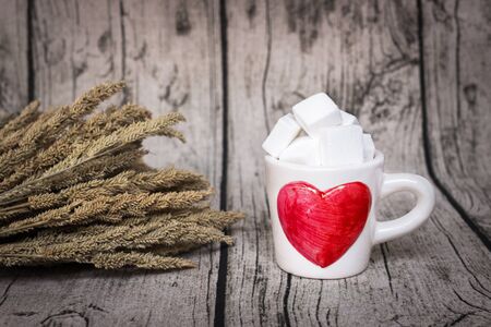 Full of love; sweet concept Valentine's Day with copy space on warm backgroundの写真素材