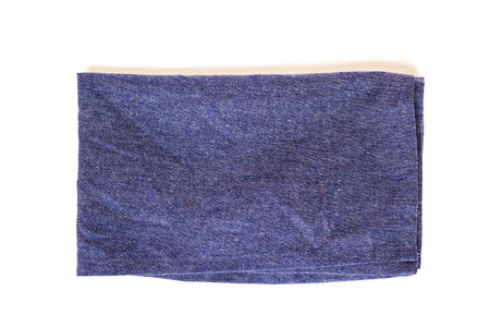 Soft fluffy blue hand towel isolated on white backgroundの写真素材