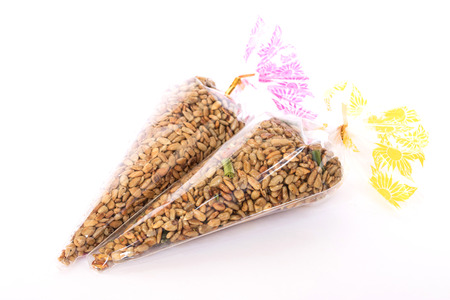 Sunflower seeds with salt and herb in plastic packaging; ready to eat. Sunflower seeds are a great snack source of vitamins and folate.の写真素材