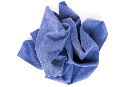 Soft fluffy blue hand towel isolated on white backgroundの写真素材