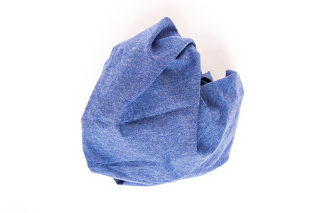 Soft fluffy blue hand towel isolated on white backgroundの写真素材