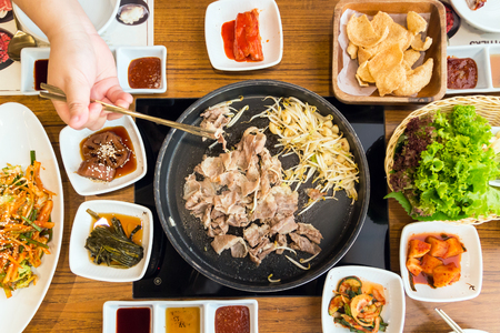 Korean food party delicious with side dishes on flat lay; top viewの写真素材