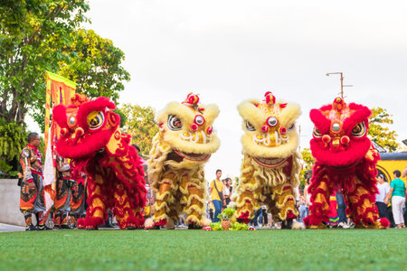 Bangkok, Thailand - January, 2019: Lion dance and confetti during Chinese New Year Celebration at MAZU shrine in LHONG 1919. The old pier in the past became to a new attraction in Bangkok, Thailand.のeditorial素材