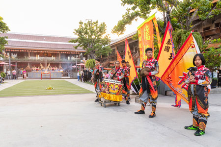 Bangkok, Thailand - January, 2019: Lion dance and confetti during Chinese New Year Celebration at...