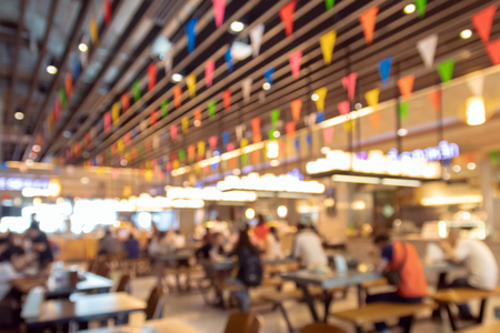 Blurred image of people at food court background.の写真素材
