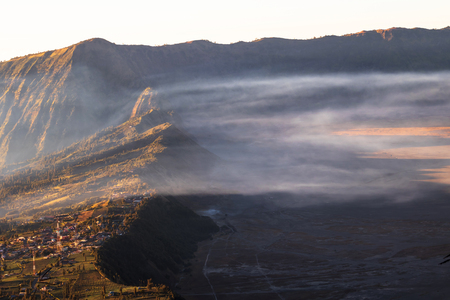 Village next to volcano Bromo, Cemoro lawang village at Mount Bromo (Gunung Bromo) at sunrise scene. Beautiful landscape and popular destinations in Indonesia.の写真素材