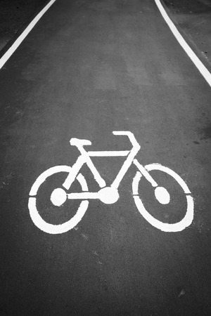 Empty cycle track with bike lane signの写真素材