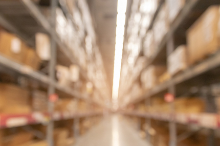 Blurred image of warehouse industrial and logistics companies, furniture product for logistic background.の写真素材
