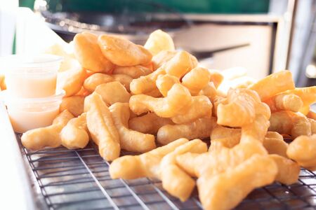 Chinese bread stick or chinese donut. Breakfast street food usually eat with hot tea, coffee or soy milk.の写真素材