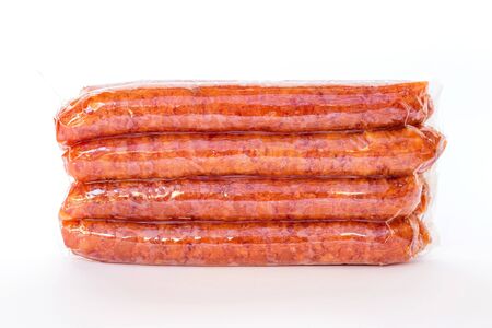 Chinese sausage in vacuum package isolated on white backgroundの写真素材