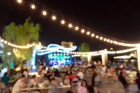 Blurred image for background of night festival at bar and restaurant.の写真素材