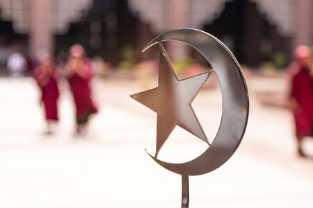The star and crescent symbol at Putra Mosque is one of the most visited landmarks in Putrajaya, Malaysia.の写真素材