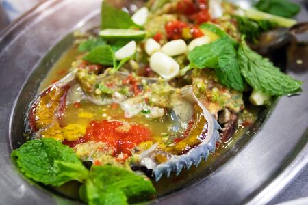 Pickled sea crab egg with spicy sauce; preserved crab with fish sauce.の写真素材