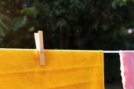 Wooden clothespins with traditional thai pattern of natural dyes extracting dyes from plant in the...