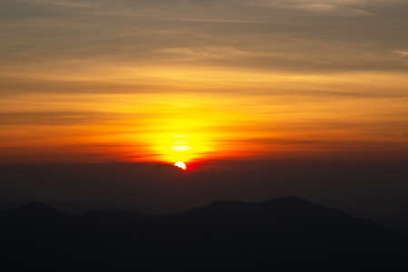 The peak of mountain with beautiful sunrise at point view. Good morning